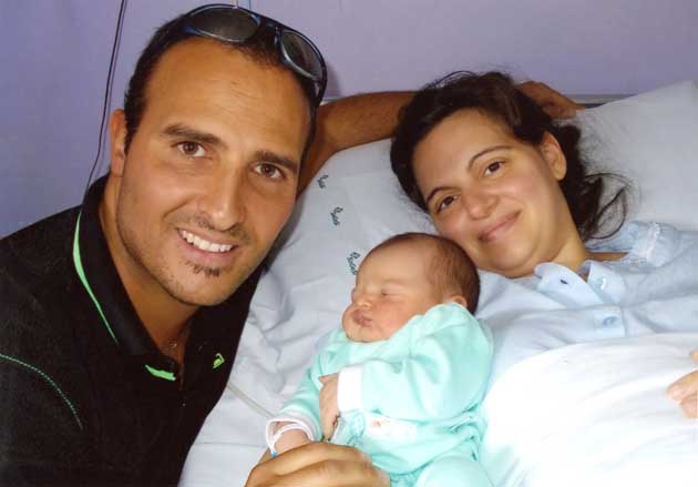 Il piccolo Guido con mamma Emanuela e papà Attilio Guido Rinaldi